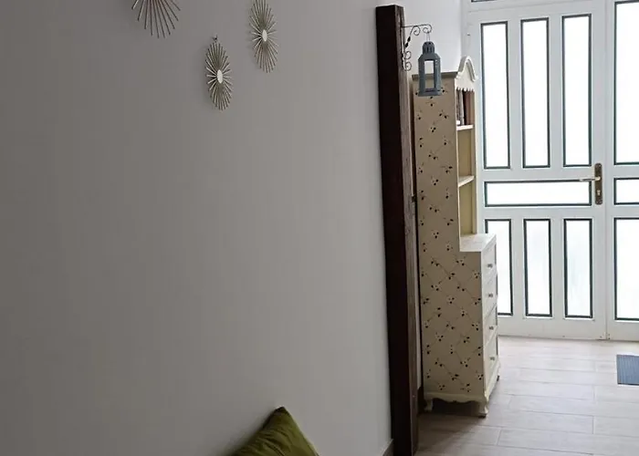 A House With A Garden, Garage, Sauna, And Jacuzzi