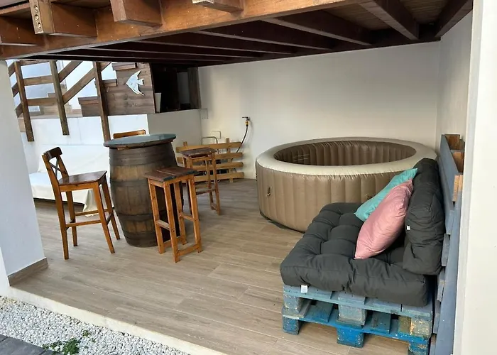 A House With A Garden, Garage, Sauna, And Jacuzzi *